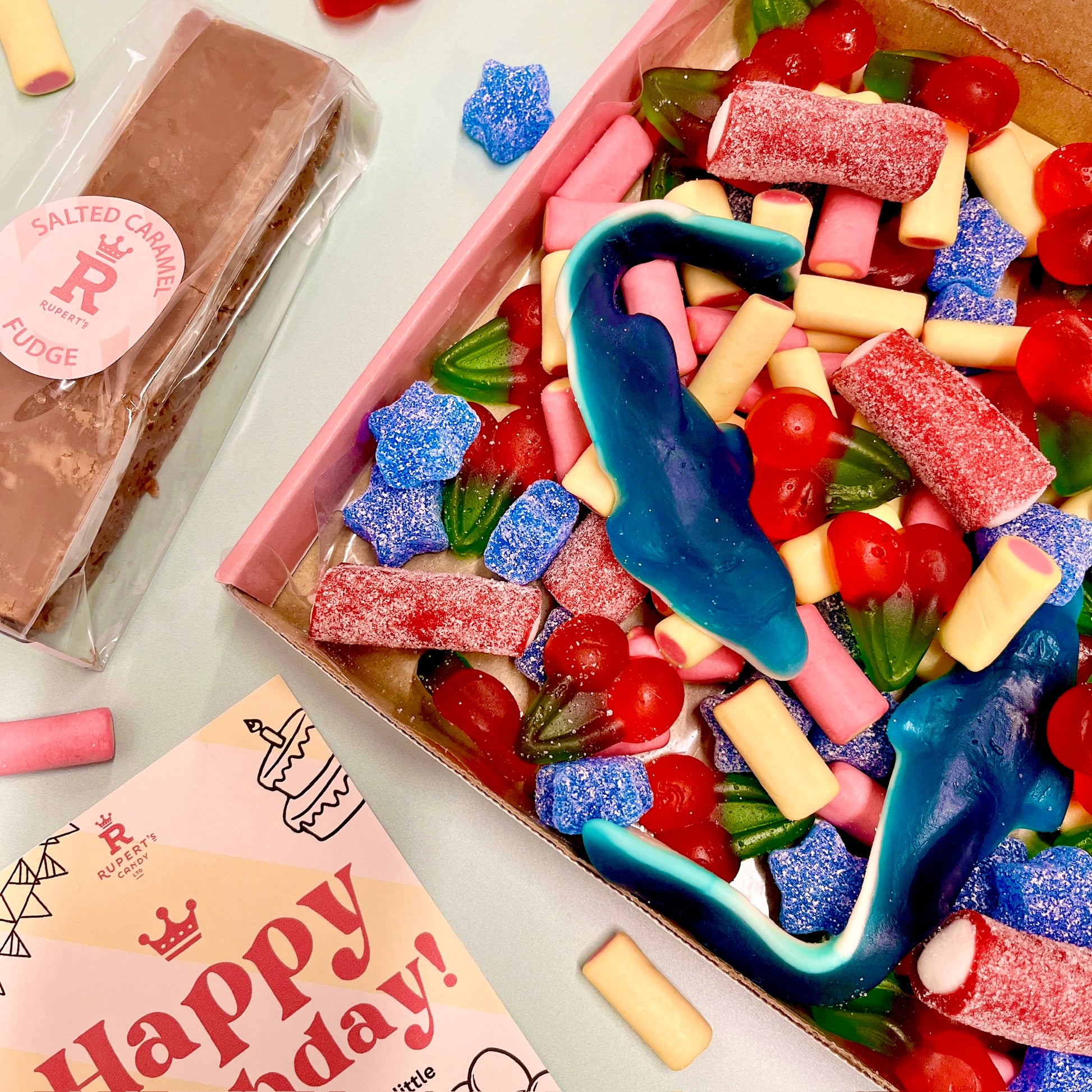 Close up of the £12 birthday bundle showing the birthday pick and mix and the salt caramel fudge with the birthday marketing card- Rupert's Candy