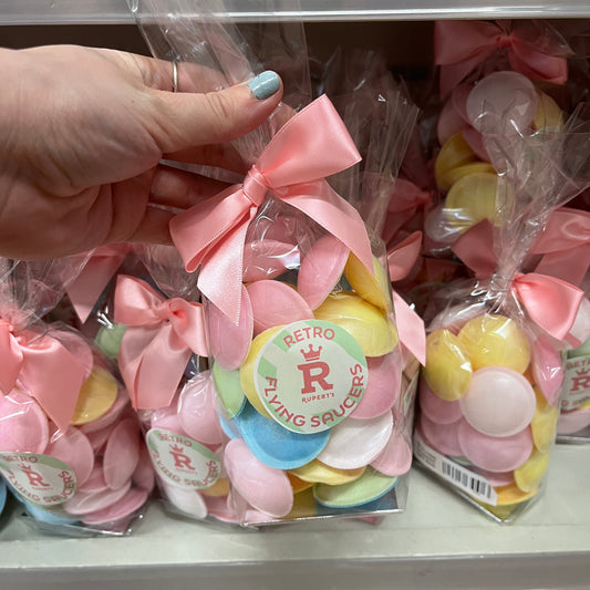 Small flying saucers gift bag being held up- Rupert's Candy