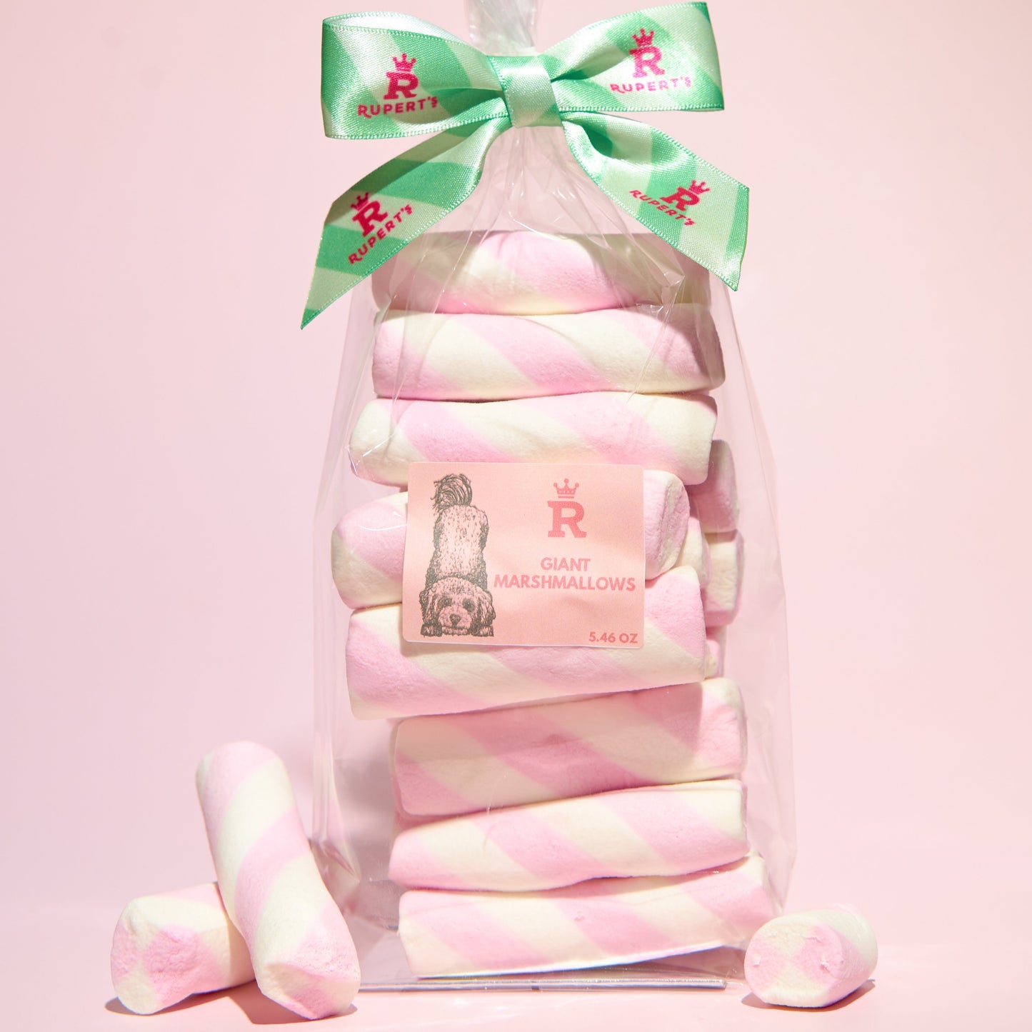 Large  gift bag of our giant marshmallows with marshmallows placed in front- Rupert's Candy