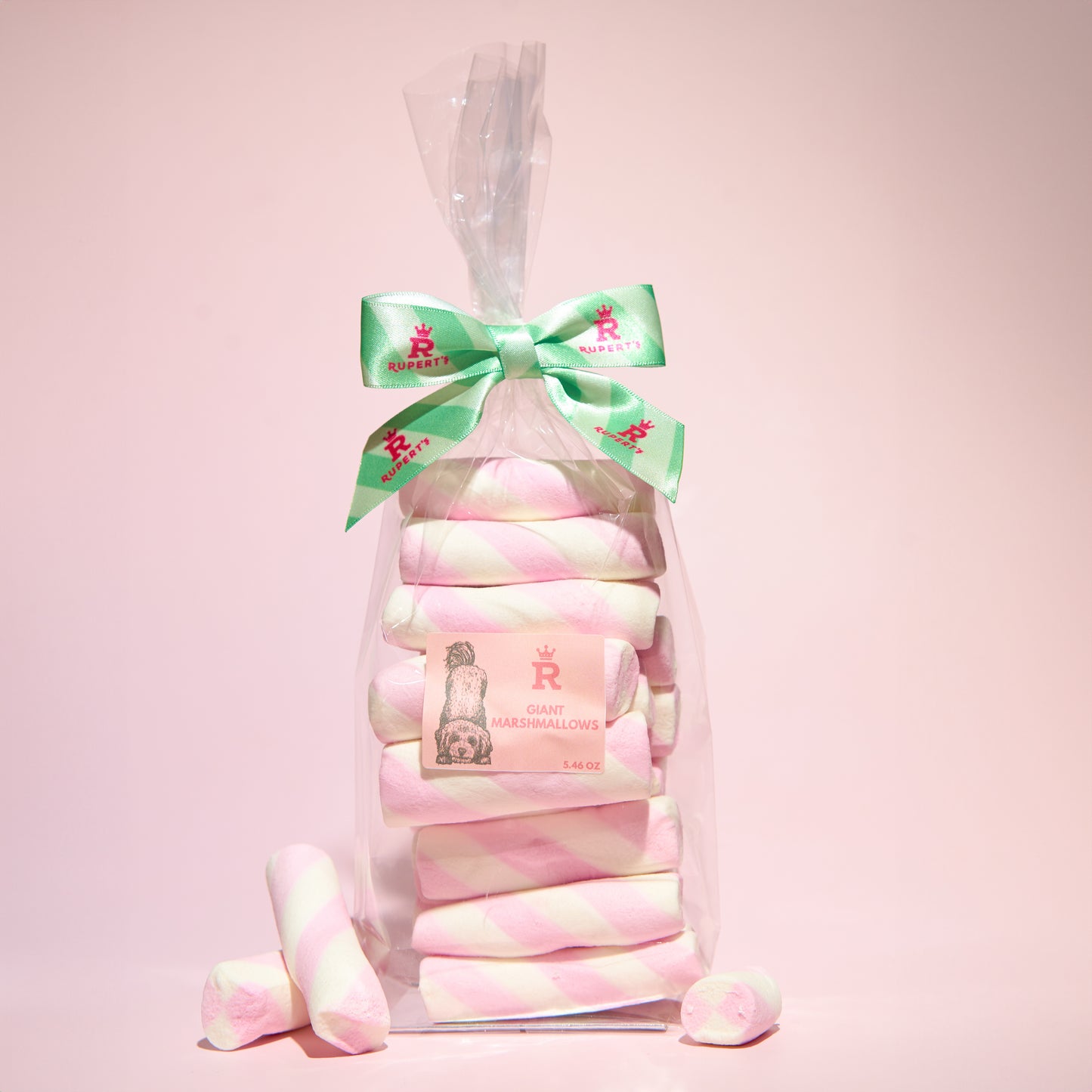 Large  gift bag of our giant marshmallows with marshmallows placed in front- Rupert's Candy