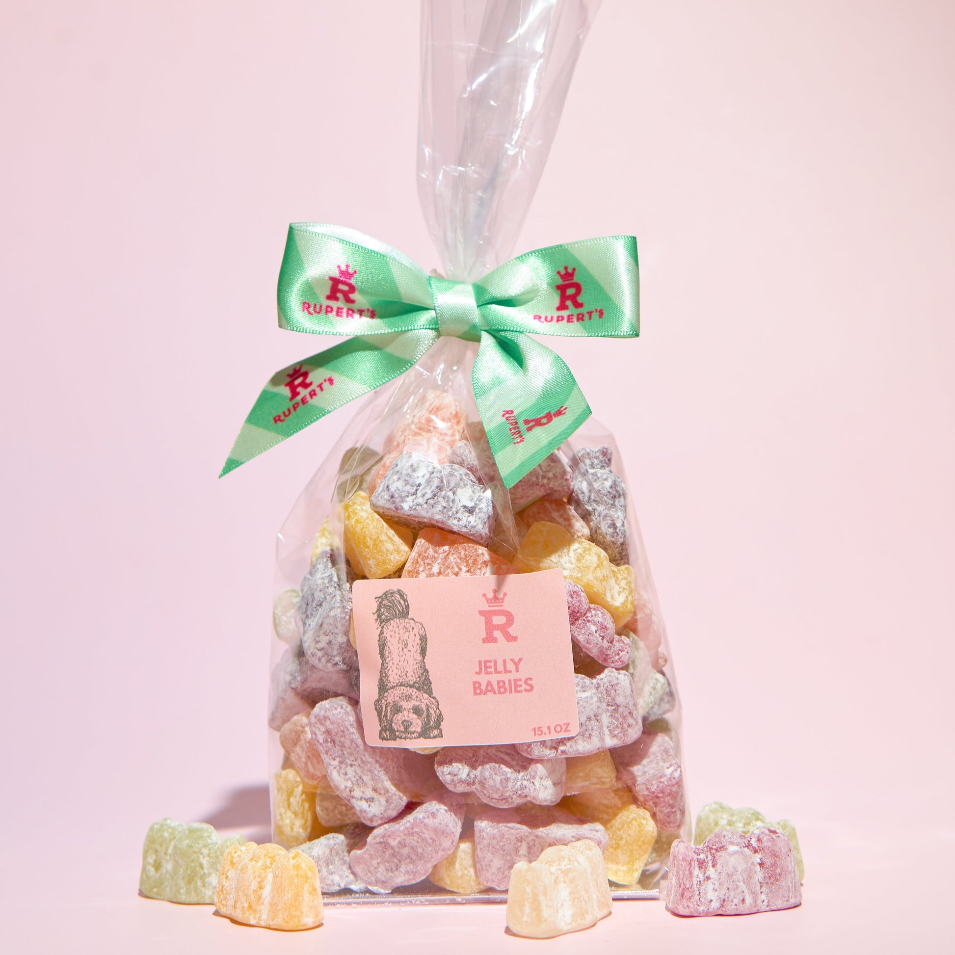 Large bag of jelly babies with jelly babies placed in front of the bag- Rupert's Candy