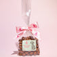 Small gift bag of chocolate enrolled raisins-Rupert's Candy